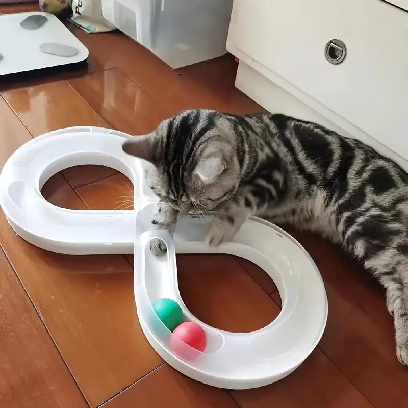 Interactive Cat Turntable Track Toy - Infinity Loop Design with Red Pill-like object